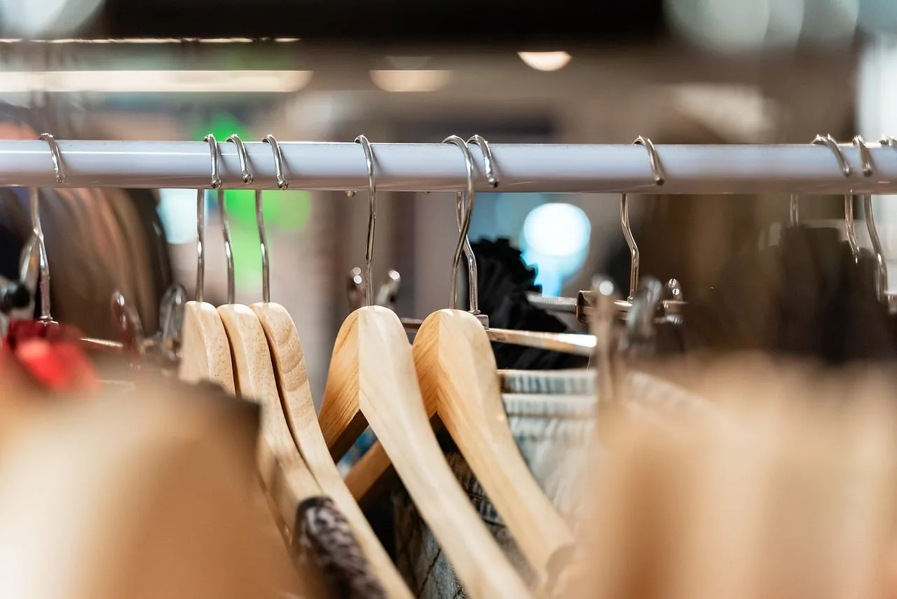 clothes, hanger, wardrobe, clothing, fashion, closet, shopping, boutique, close up, rack, rail. How to Choose Modular Closet Systems That Last