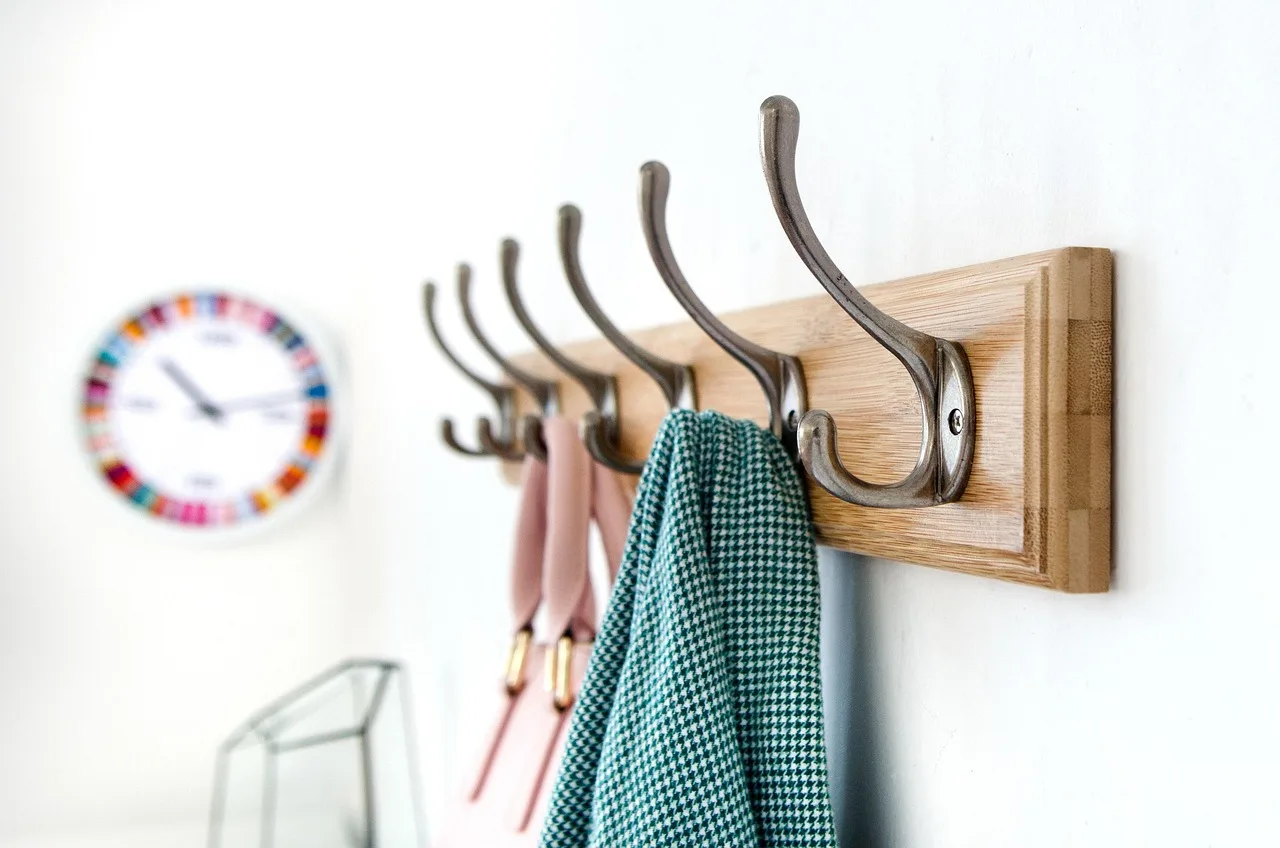 hook, wall-mounted hook, bedroom, hook, hook, hook, hook, hook. Rental storage that survives move-out: damage-free systems compared