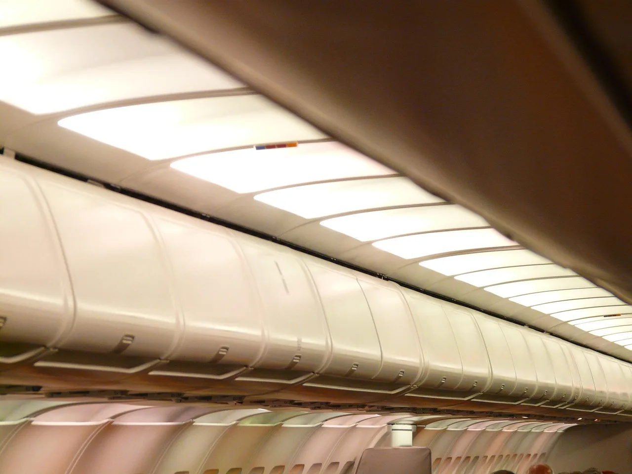 plane, storage space, inner space, luggage, luggage compartments, stow, aircraft cabin, cabin, boxing, ceiling, lighting, storage space, luggage, luggage, luggage, luggage, aircraft cabin, aircraft cabin, aircraft cabin, aircraft cabin, aircraft cabin, cabin. Where storage systems projects most often come apart